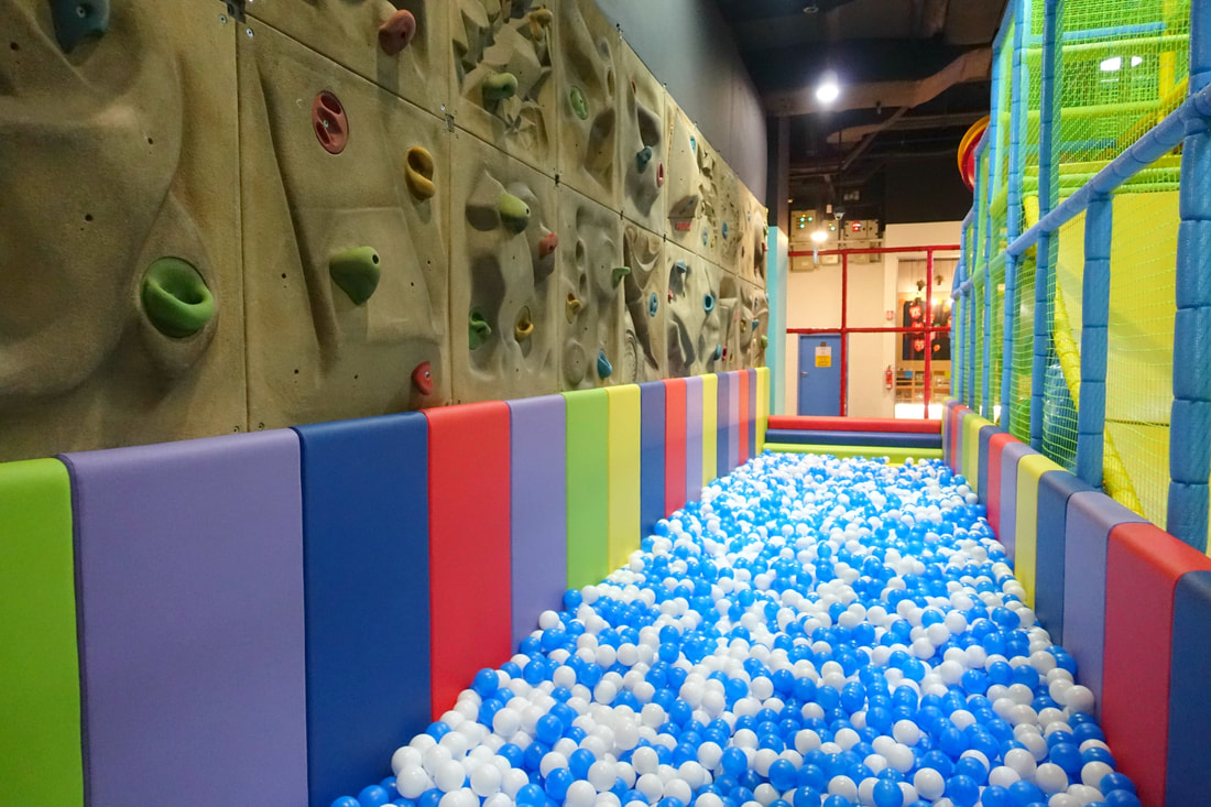 A fun ball pit is situated right next to the playgym and there is a rock wall course that older kids can attempt here. 