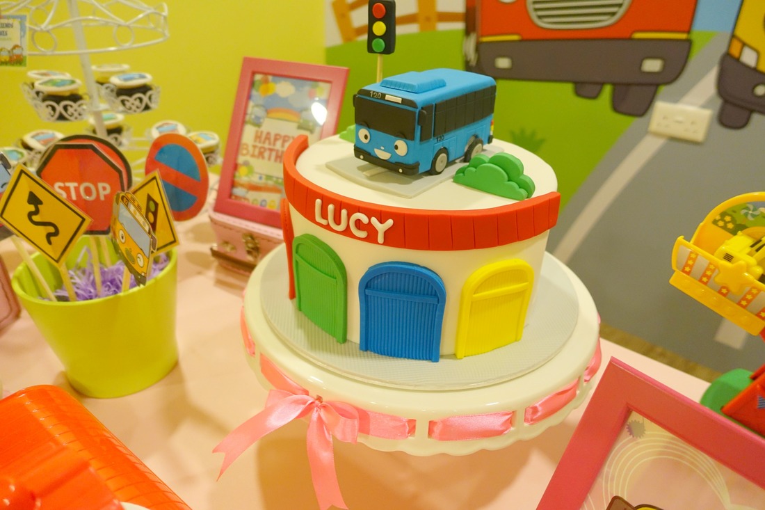Look at the adorable birthday cake! Love that Tayo bus on top and the parking garage design at the front! 