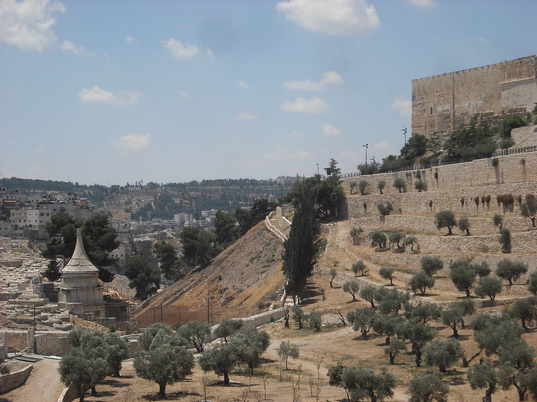 Absalom's Monument as seen on the bottom-left of the photo, is situated below Jerusalem, in the Kidron Valley. 