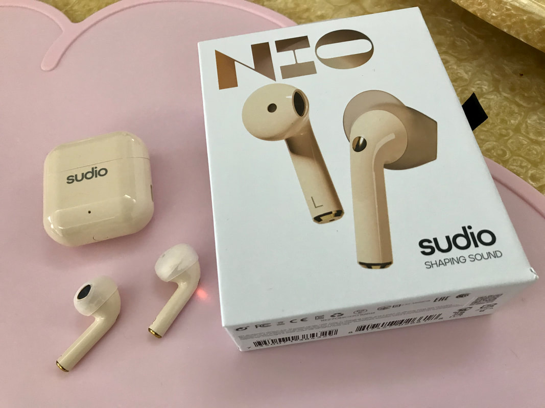 The Sudio Nio box and earphones in 