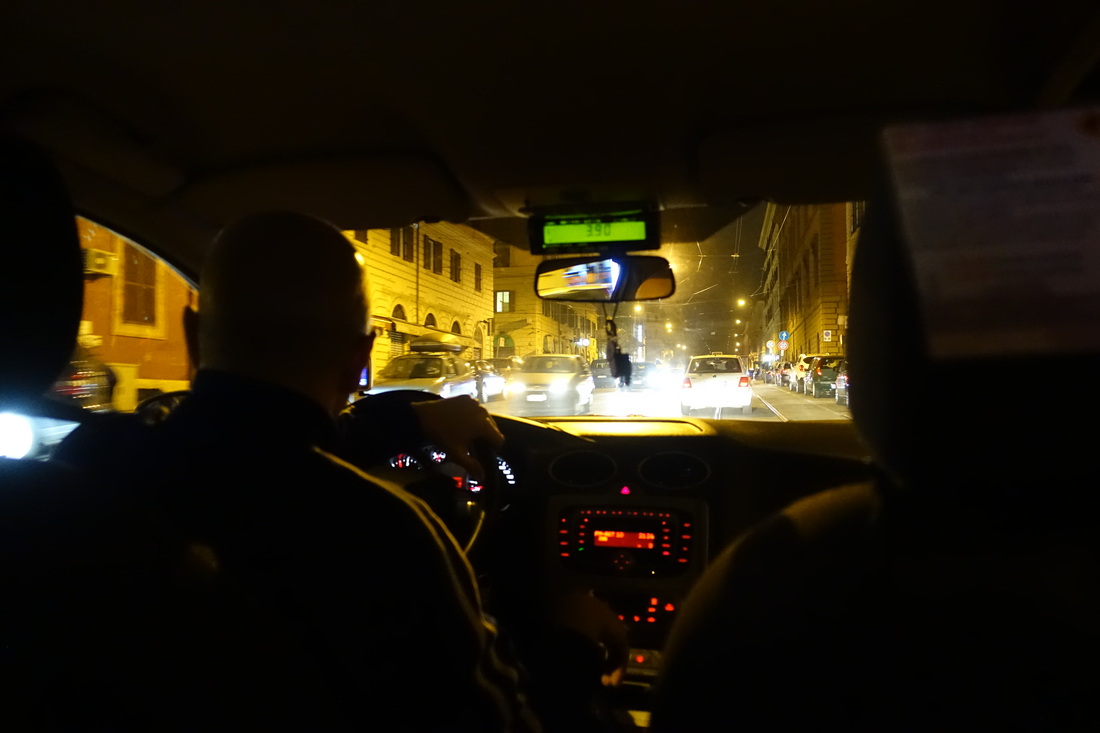 Us taking a taxi at night from Termini Station (the Central Station in Rome) back to the hotel.