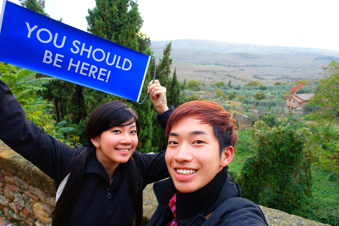 Milton Goh and Amilee Kang at Montepulciano, overlooking the rolling green plains of Tuscany! 