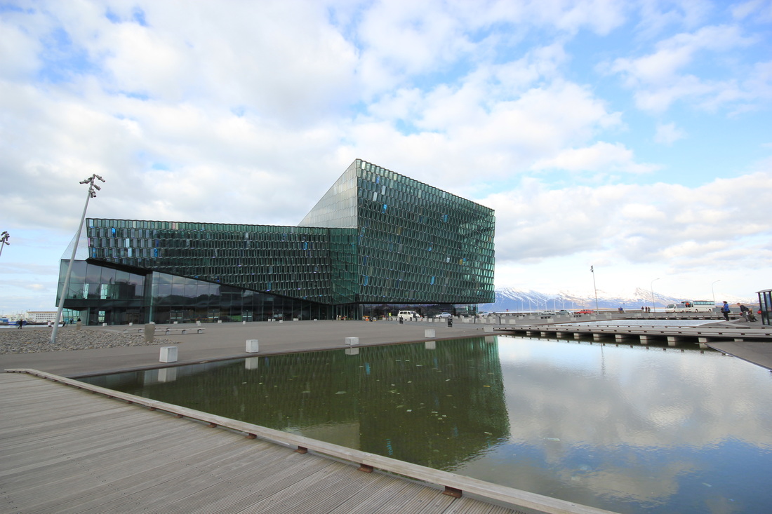 Visit the beautiful Harpa Concert Hall to watch a performance in Reykjavik, Iceland!